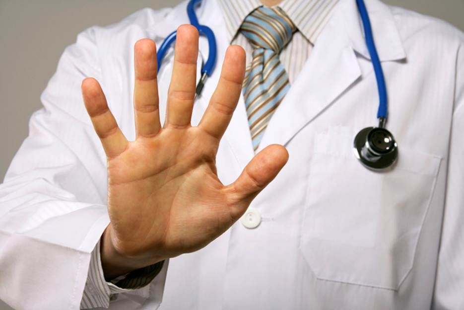 A doctor with his hand raised

AI-generated content may be incorrect.